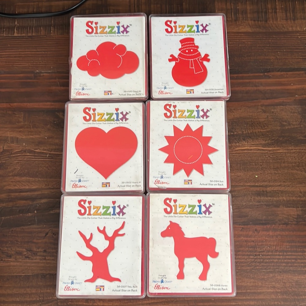 Sizzix large die cuts cloud, snowman, heart, sun, tree and horse
